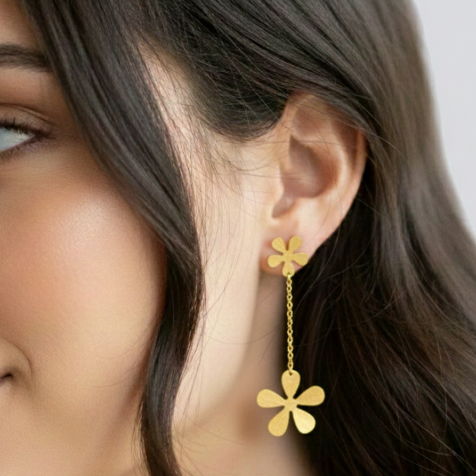  Dual Flower Danglers, Description- Beautifully crafted floral danglers. Very unique in its style. Gold electroplated. Danglers with chain. 