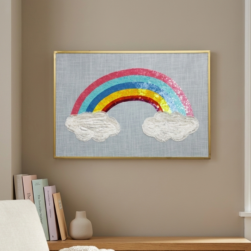  Framed artwork of a rainbow and clouds on a wall above a sofa. 