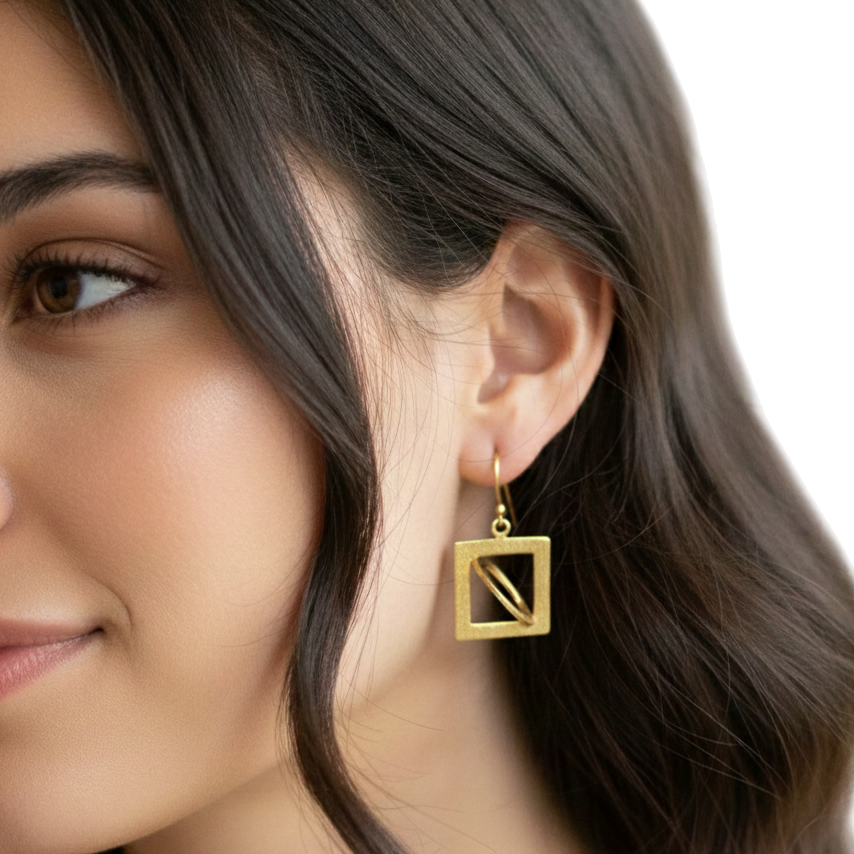  Gold Plated geometric shaped modern studs, Description- These are modern looking gold electroplated studs which can be worn with all outfits . they look elegant as fish hooks make the studs dangle. They can suit all face cuts 
